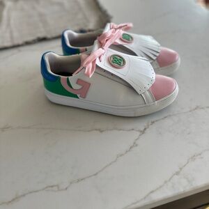 G/FORE Kiltie Disrupt Pink, White, and Green Golf Shoes.